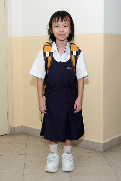 Esther in Primary School uniform