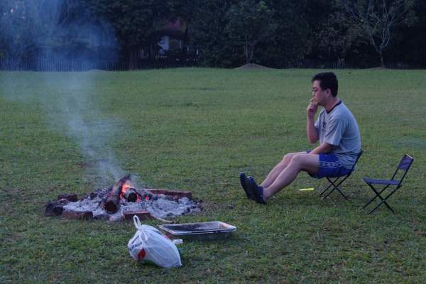 Paul warming up over the fire