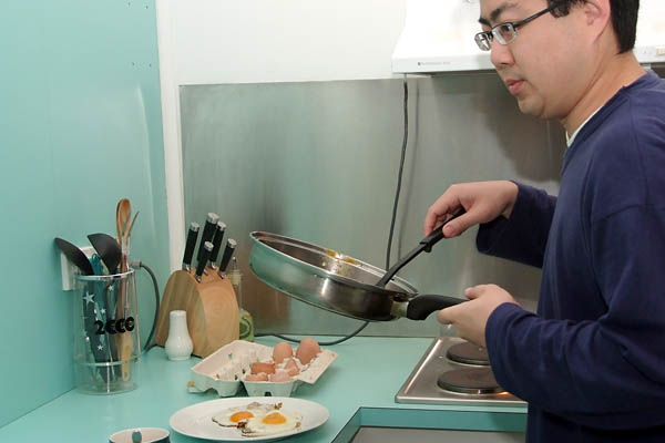 Paul frying the fresh farm eggs with SIA butter